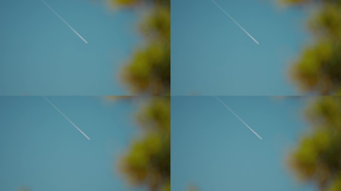 喷气式飞机在蓝天上留下了白色的足迹。飞机起飞或降落。