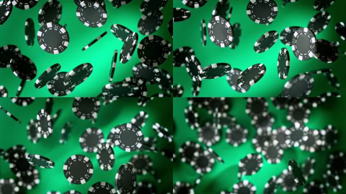 赌场筹码爆炸的超级慢动作镜头，在绿色背景下，1000帧/秒。