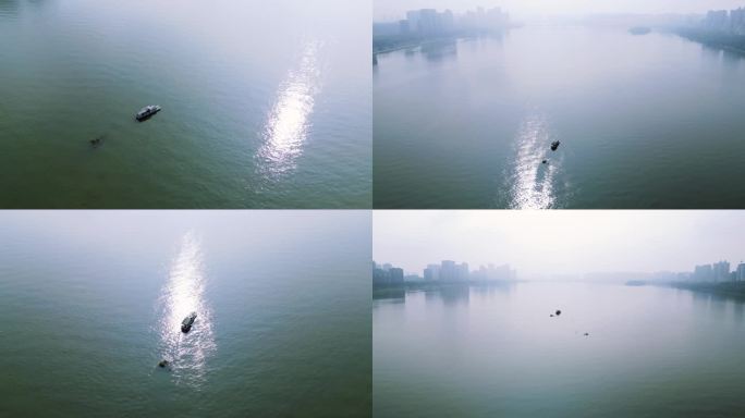 晨雾浓雾，大雾连江，小船在江中行驶