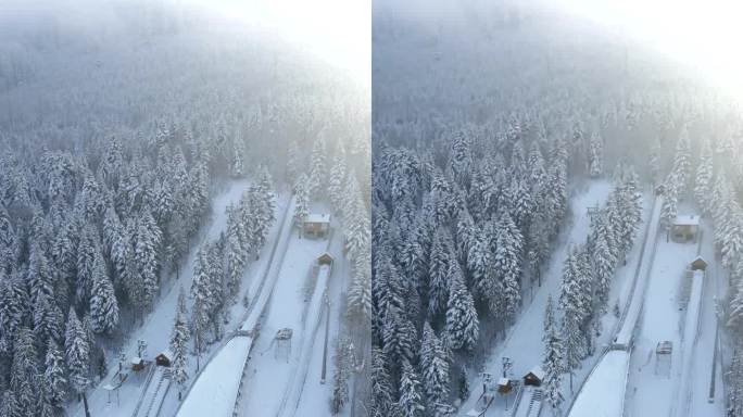 滑雪飞山在山上的冬季森林，空中，波兰