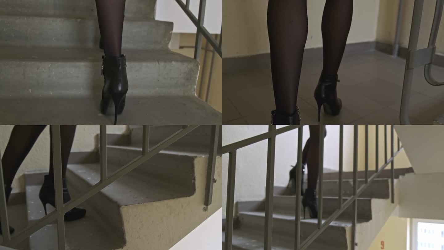 穿着黑色紧身衣和高跟短靴的女人们爬上楼梯间的台阶。摄影机跟着那个女孩。