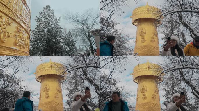 云南景点香格里拉冬季雪景游客金色转经筒