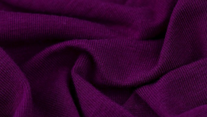 一个深紫色的棉线钩针织物的特写镜头