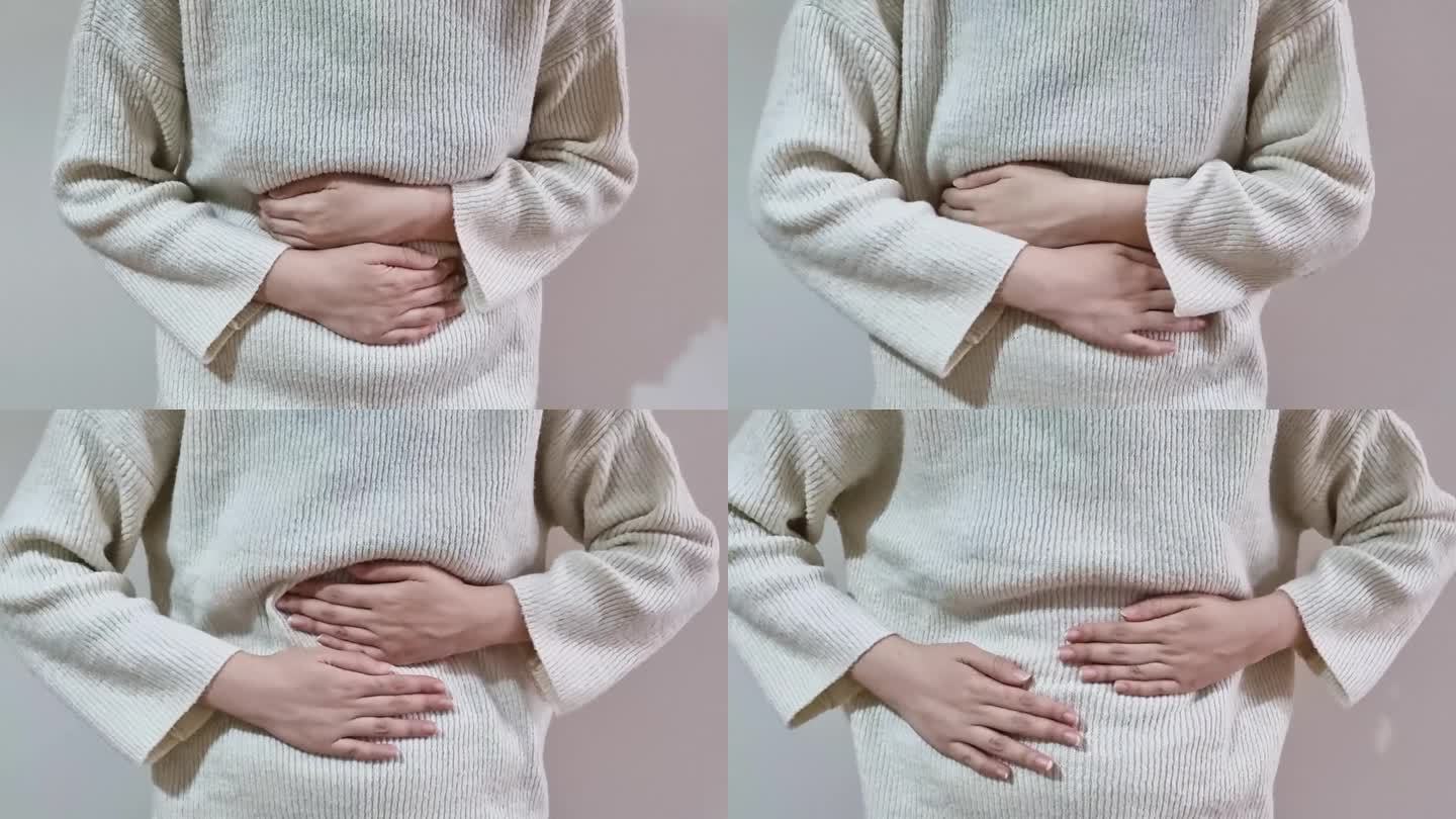 一段无法辨认的年轻女子胃痉挛的视频
