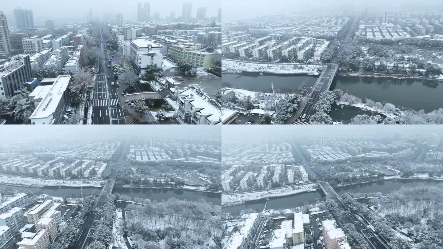 宣城雪景鳌峰路冬季下雪城市航拍大桥