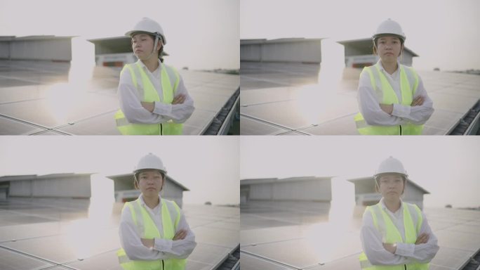身着制服的亚洲女工程师看着镜头微笑。
