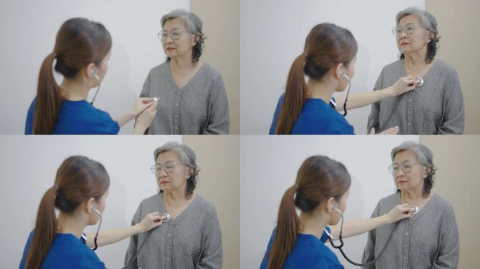 亚洲青年女医生在医院里用听诊器听老年妇女病人的心脏，检查老年妇女的健康，检查成熟中年妇女的肺部。