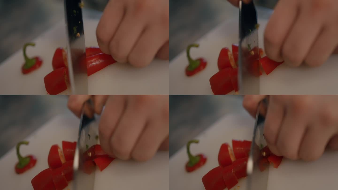 专业厨师用锋利的菜刀切红甜椒