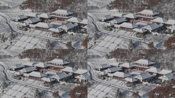 航拍威海市环翠区华夏城景区太平禅寺雪景