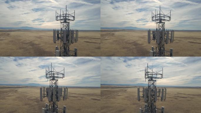 电信塔的近景鸟瞰图。在电信塔的顶部安装了天线和发射器，可以传输lte、5g、4g网络和移动gsm运营