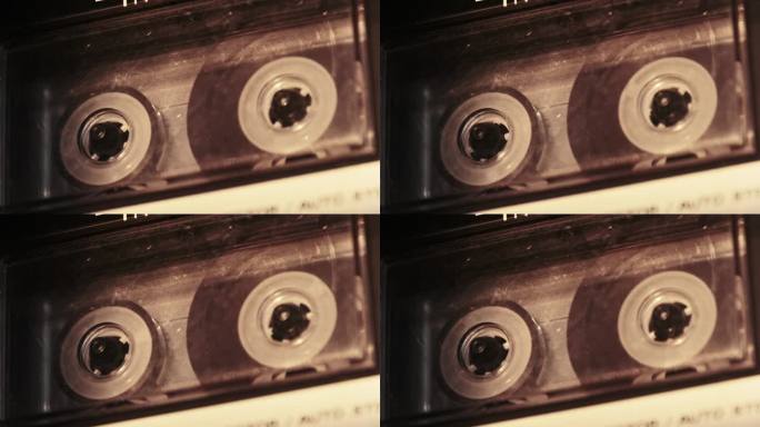 音频磁带回放在复古磁带录音机，透明卷轴与磁带