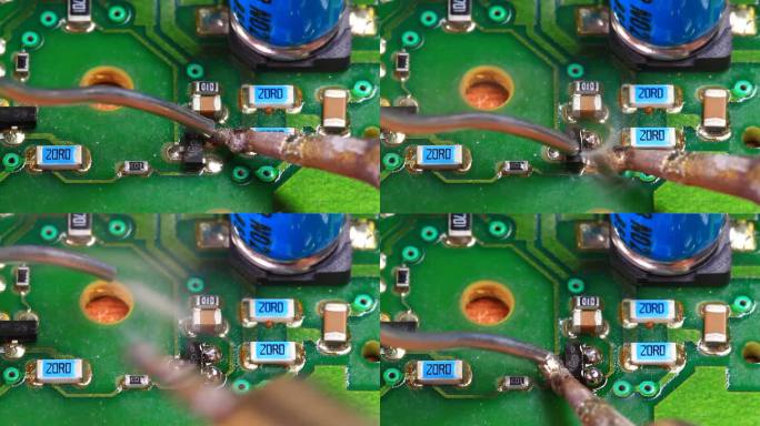 技术人员使用印刷电路板上的烙铁拆下并移除表面安装的电阻