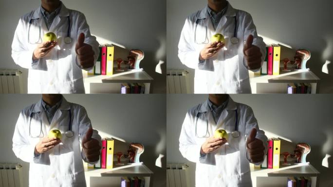 医生在办公室里拿着苹果、蔬菜、坚果和卷尺。本人接受均衡饮食、营养、健康预防，养成预防心血管疾病、糖尿