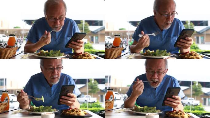 老年患者在食堂吃健康沙拉午餐，使用智能手机，健康生活方式。