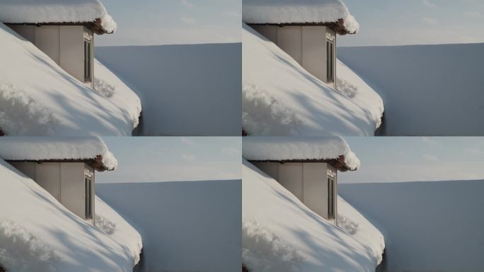 冬天，雪覆盖着农村家庭的天窗和屋顶