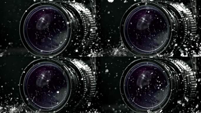 水珠落在带镜头的照相机上。用高速摄像机拍摄，每秒1000帧。