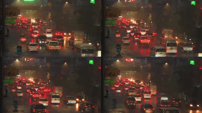 在一个雨夜，许多汽车在城市道路上堵塞。红色的背光反射在潮湿的沥青上
