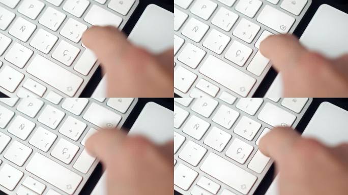 白人手指在笔记本电脑或台式电脑的白色键盘上多次按回车键联机技术问题近距离微距拍摄