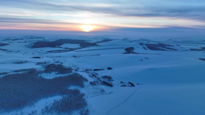 呼伦贝尔自然风光丘陵山地雪野夕阳