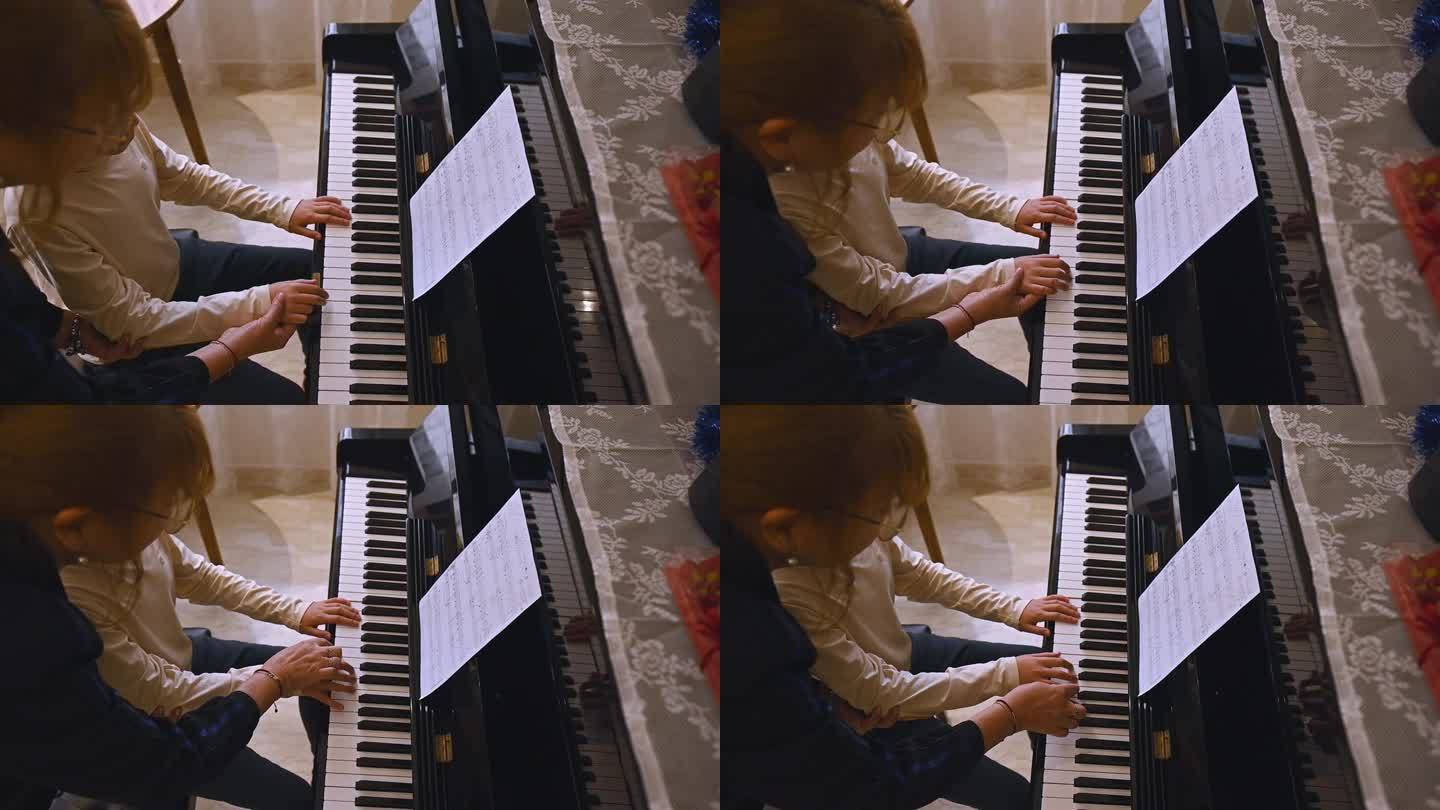 音乐教师，钢琴家，教钢琴，向学生解释手指在钢琴键上的正确位置