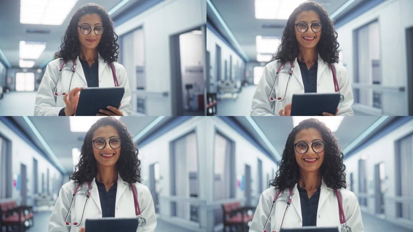 一位经验丰富的白大褂女医生在医院走廊用平板电脑工作的画像。医疗保健专业人员或护士长看着镜头，温柔地微