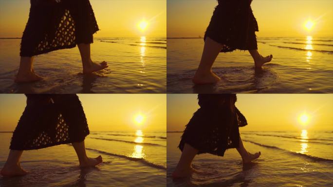 浪漫空镜唯美女生光脚沙滩慢步行走脚步特写