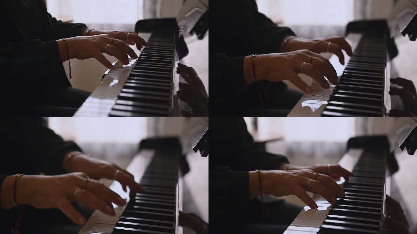 女钢琴家弹奏钢琴时手指放在琴键上的特写侧视图