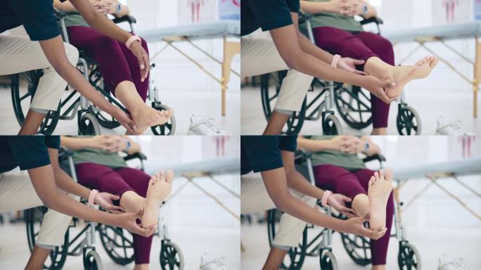 踝关节康复，轮椅或医生与病人一起帮助锻炼腿在锻炼恢复。物理治疗，手部特写或残疾人伸展咨询护士