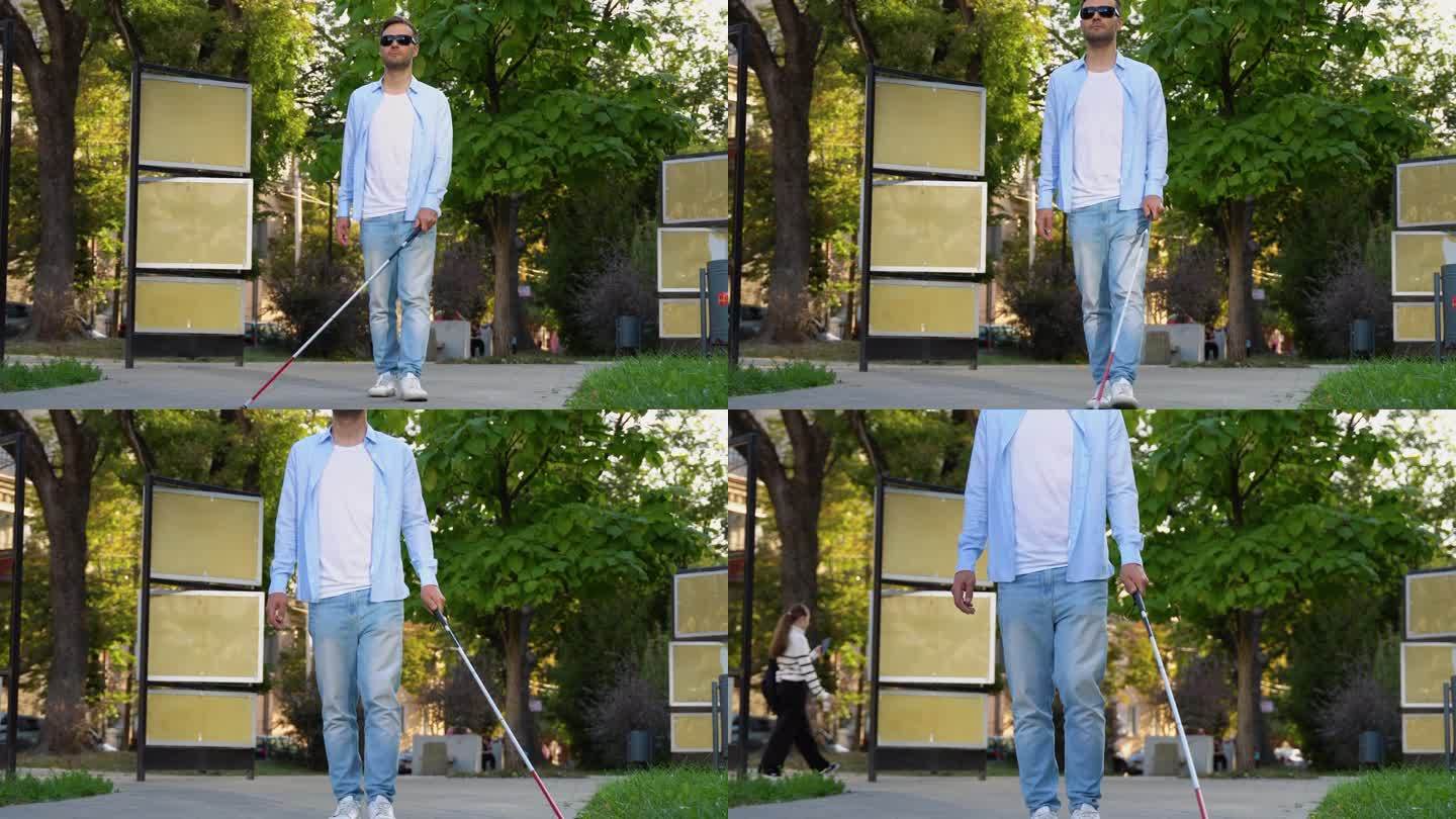 一个盲人走在街上。拄着拐杖的视障男子