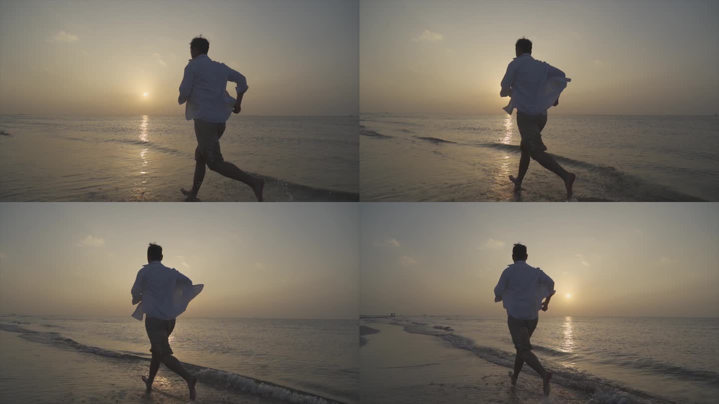 男人逆光奔跑沙滩跑步背影追逐梦想阳光少年