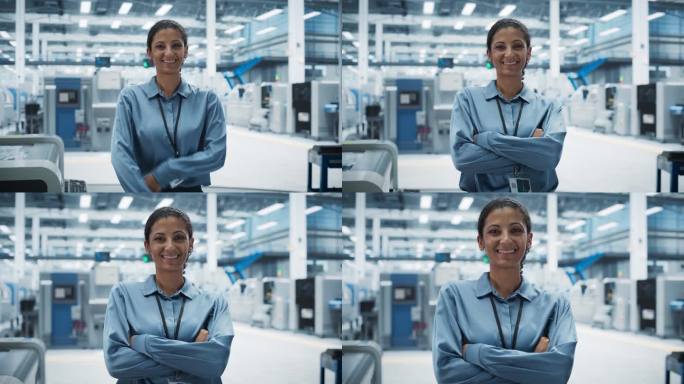 西班牙裔女性设施经理的肖像，双臂交叉，看着镜头，微笑着。工业专家在一家自主电子工厂工作，生产现代计算