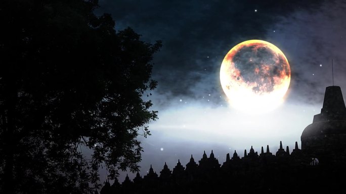 婆罗浮屠寺的剪影与满月的景象