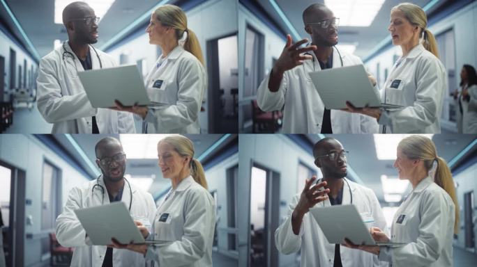 医院病房:女医生与专业的黑人护士长或外科医生交谈，他们使用笔记本电脑。现代临床不同医疗专家团队讨论检