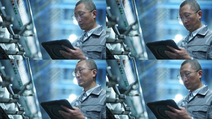 男工人平板电脑在化纤厂纺织厂生产车间