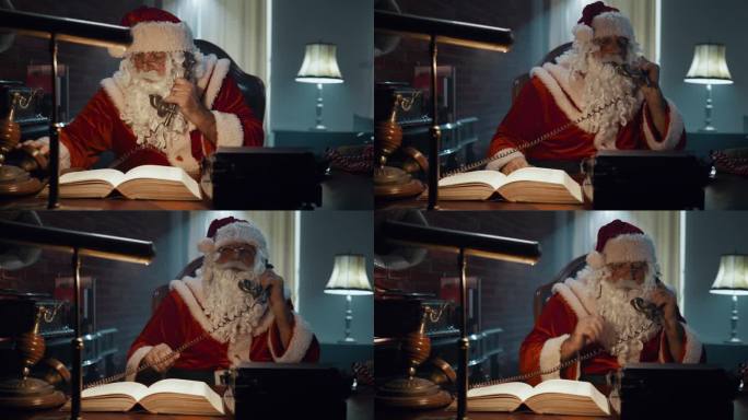 圣诞老人在他的家庭办公室里使用一个复古的老式电话桌面家庭固定电话