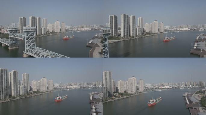航拍滨海新区开启桥过货轮