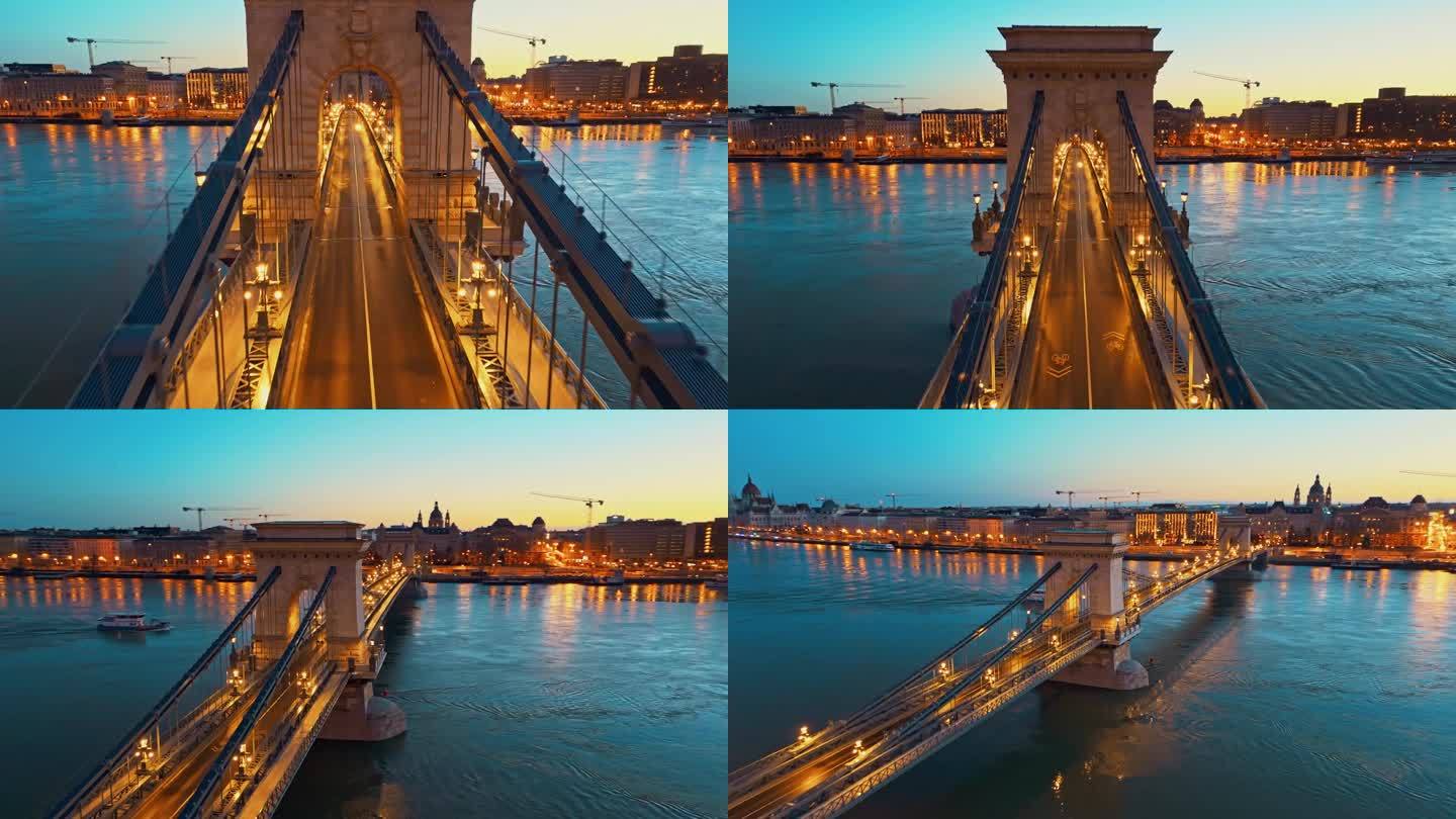 缩小无人机拍摄的照亮sz<s:1> chenyi链桥在多瑙河在黄昏期间在布达佩斯，匈牙利