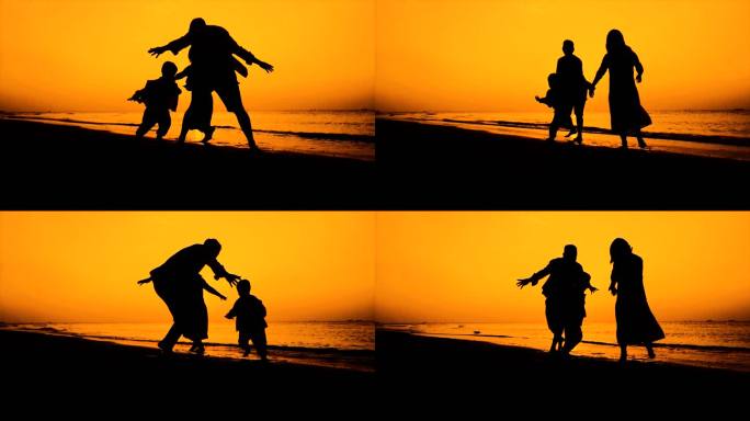 一家三口沙滩奔跑剪影幸福家庭欢乐童年亲子