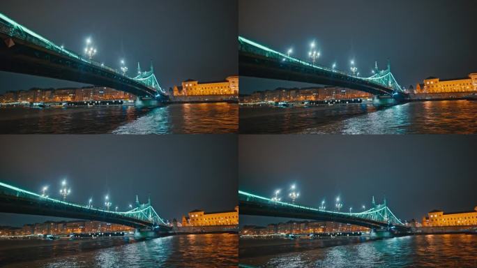 匈牙利，布达佩斯，多瑙河上明亮的自由桥下的船景