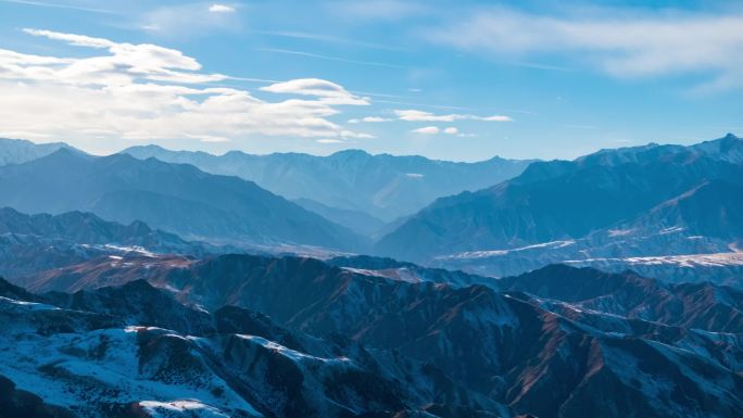 4k冬季草原 祁连山 蓝天白云航拍延时