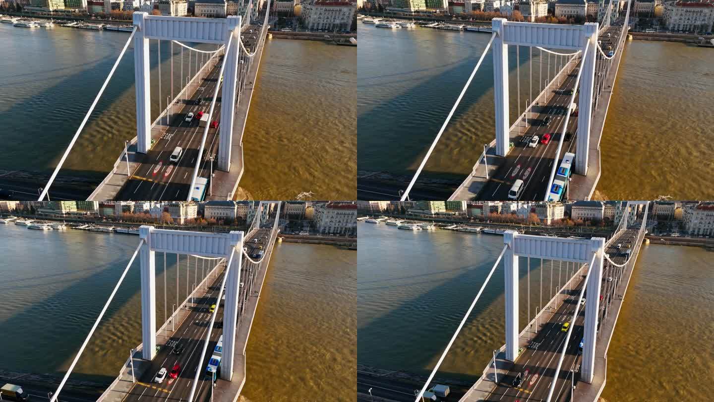 无人机拍摄的车辆行驶在多瑙河上伊丽莎白桥在晴朗的一天在匈牙利