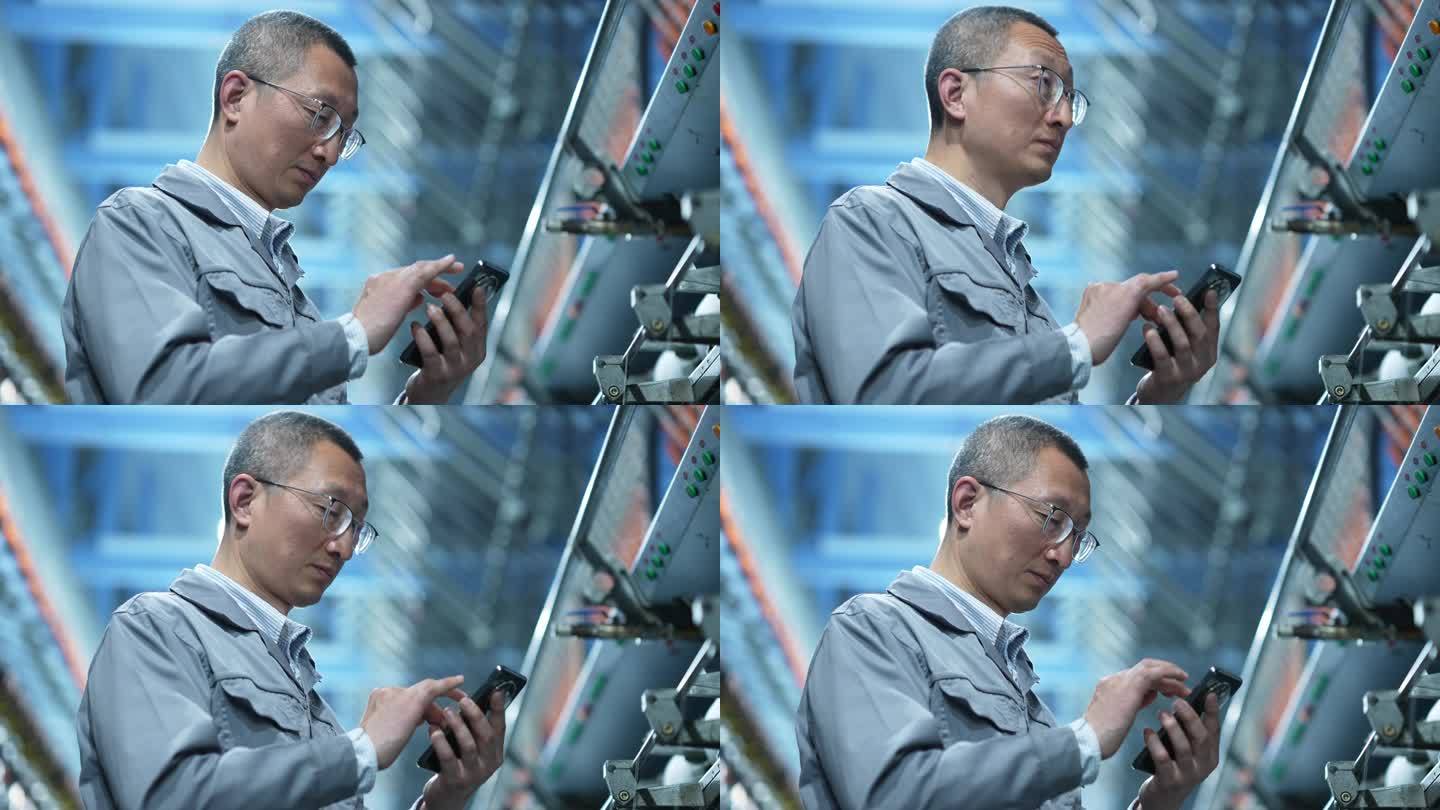 男性纺织工人化纤厂纺织厂生产车间使用手机