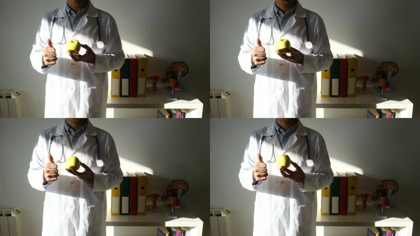 医生在办公室里拿着苹果、蔬菜、坚果和卷尺。本人接受均衡饮食、营养、健康预防，养成预防心血管疾病、糖尿