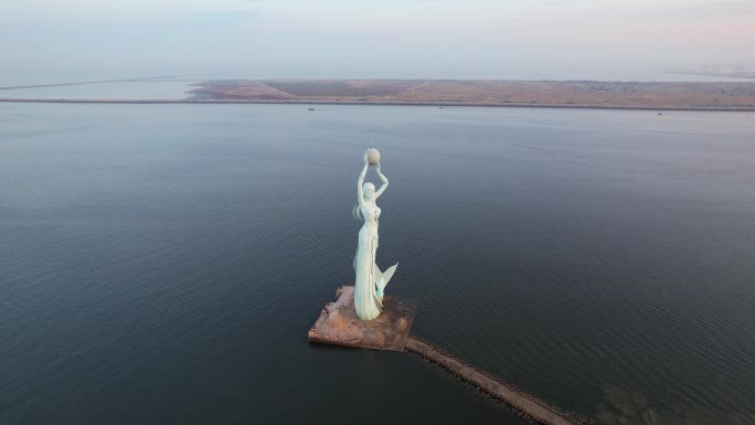 鲅鱼圈日出朝霞山海广场鲅鱼公主雕塑航拍