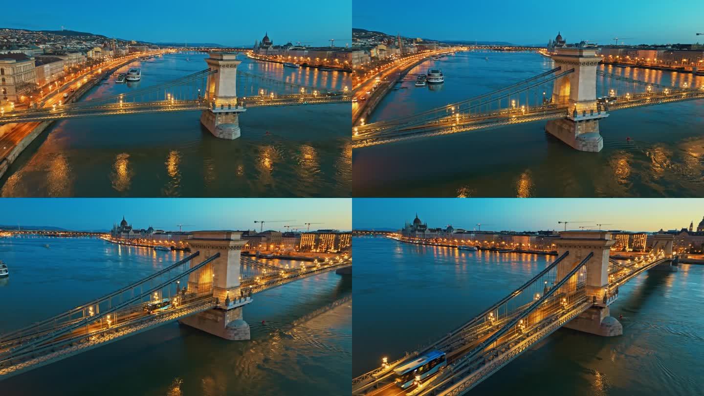 无人机拍摄的照亮sz<s:1> chenyi链桥在多瑙河上的黄昏在布达佩斯，匈牙利