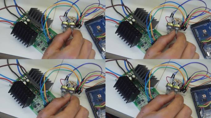 学生在学校通过遥控使用机械臂。