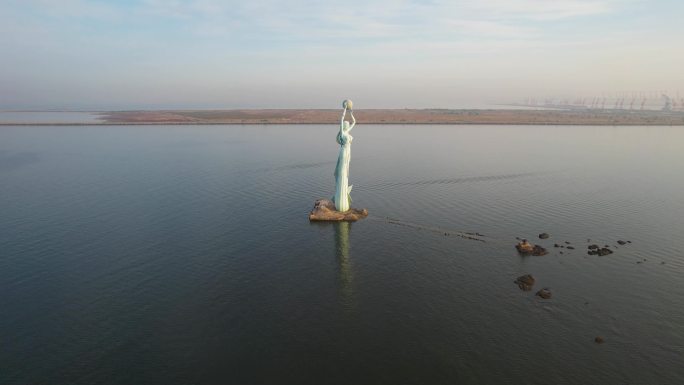 鲅鱼圈日出朝霞山海广场鲅鱼公主雕塑航拍