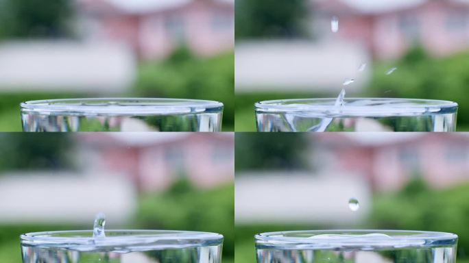 当水进入装满干净、清澈水的玻璃杯时，水滴就形成了。