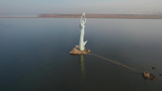 鲅鱼圈日出朝霞山海广场鲅鱼公主雕塑航拍