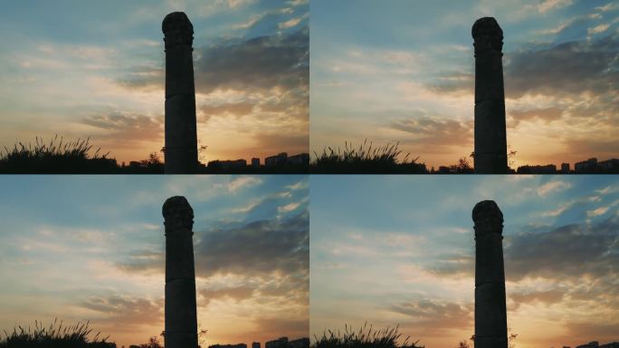 土耳其梅尔辛的庞培里奥波利斯，夕阳西下，柱影拉长。一个古老的柱子屹立着，一个永恒的哨兵。每根柱子都讲
